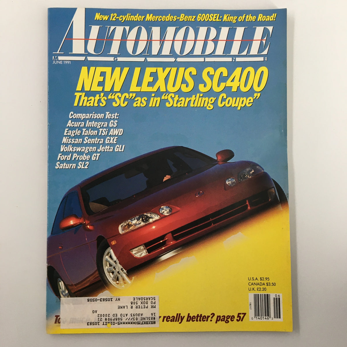 Cover of Automobile Magazine June 1991 featuring a comparison test of Lexus SC400 and Acura Integra GS, highlighting key features and luxury cars of the era.