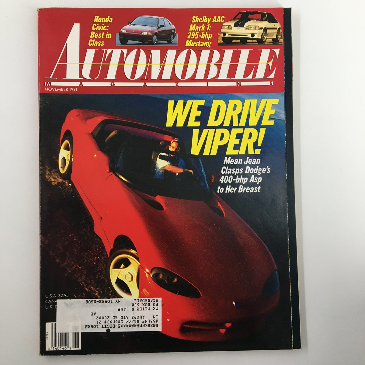 Cover of Automobile Magazine November 1991 titled 'Mean Jean Clasps Dodge's 400-bhp Asp' featuring a red sports car, highlighting the phrase 'WE DRIVE VIPER!' and showcasing vintage automotive culture.