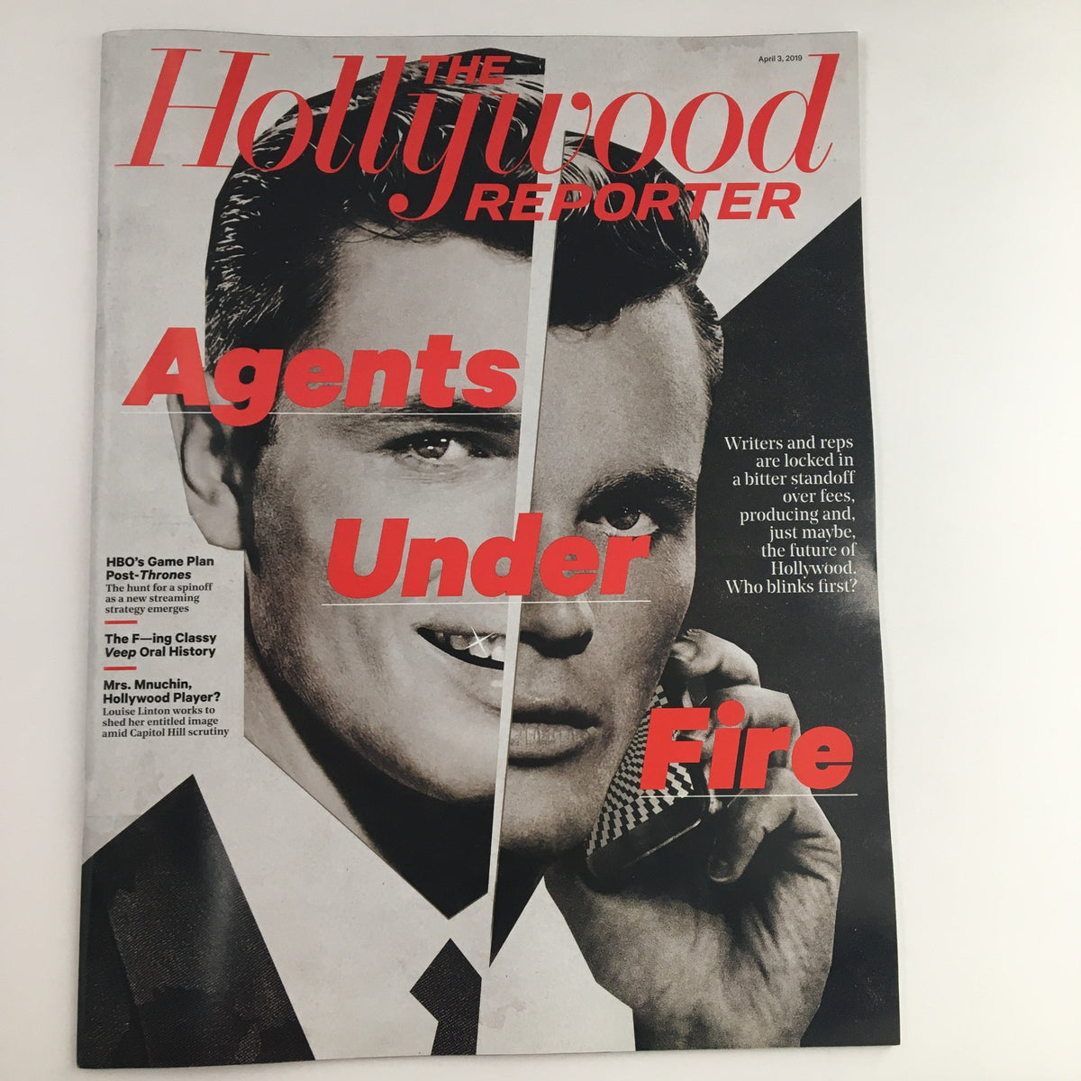 The Hollywood Reporter April 3 2019 magazine cover featuring 'Agents Under Fire' with a split image of a man, showcasing insights into Hollywood and celebrity culture.
