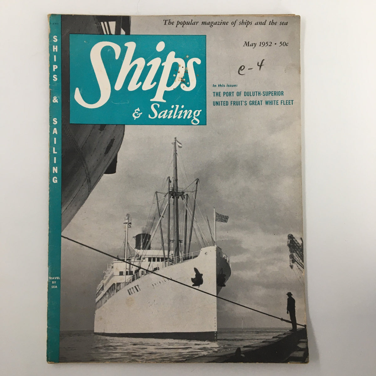 Cover of the vintage magazine 'Ships and Sailing' from May 1952, featuring the Quirigua and showcasing maritime themes with a large ship and historical maritime elements.