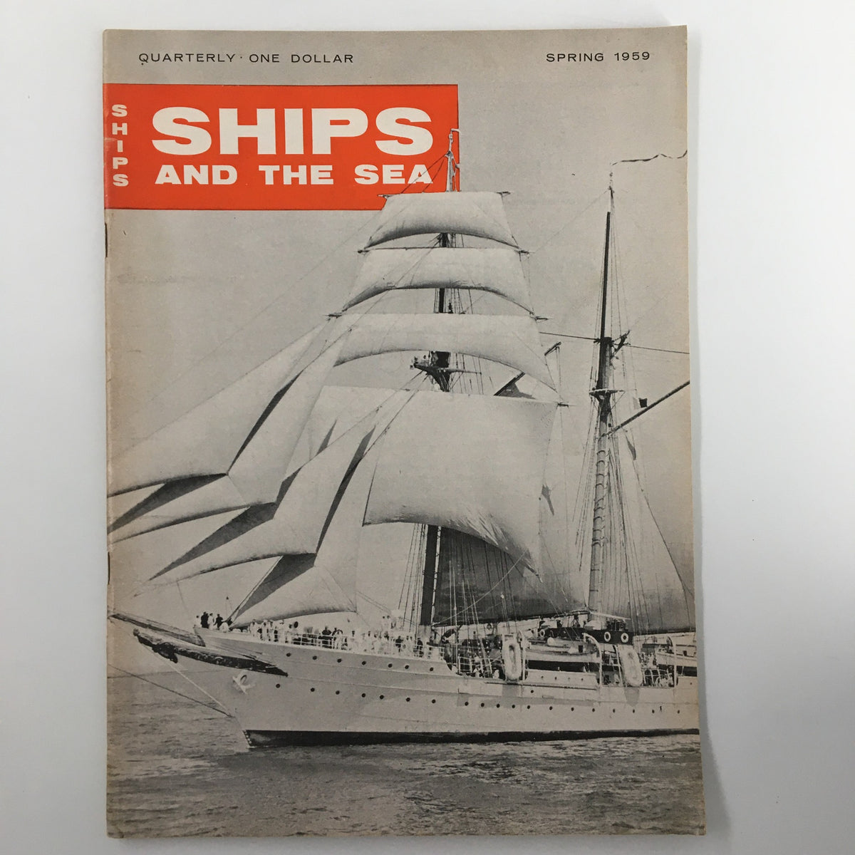 Cover of VTG Ships and the Sea Magazine Spring 1959 featuring the ship Juan Sebastian de Elcano, showcasing vintage naval exploration.