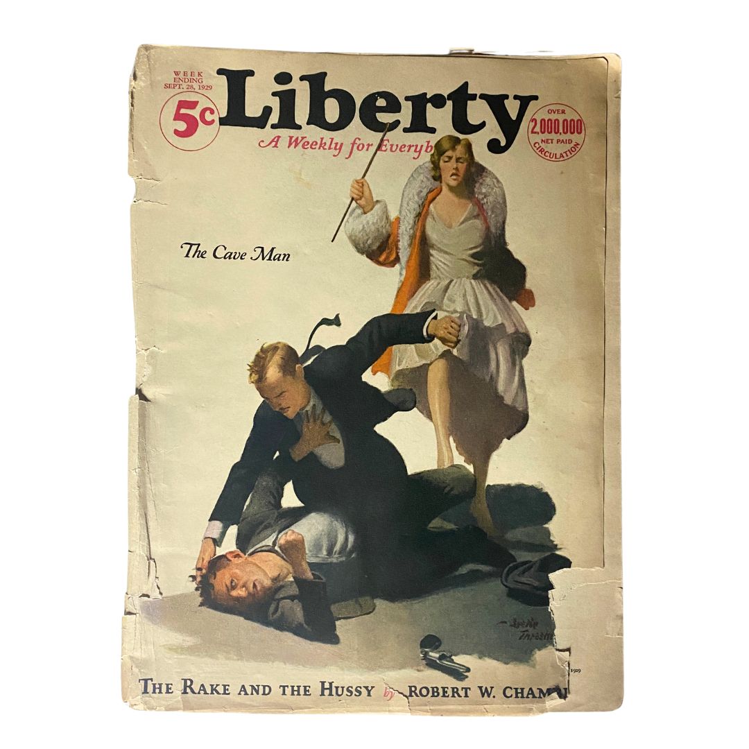 Cover of Liberty Magazine, September 28, 1929, featuring the article 'The Cave Man.' The artwork depicts a dramatic scene with a man confronting a woman, encapsulating the era's cultural nuances.