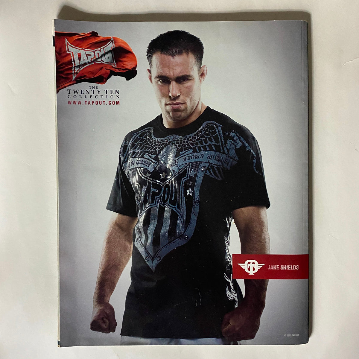 Fighters Only US Magazine July 2010 featuring Jake Shields in a Tapout advertisement, highlighting the MMA culture and community.
