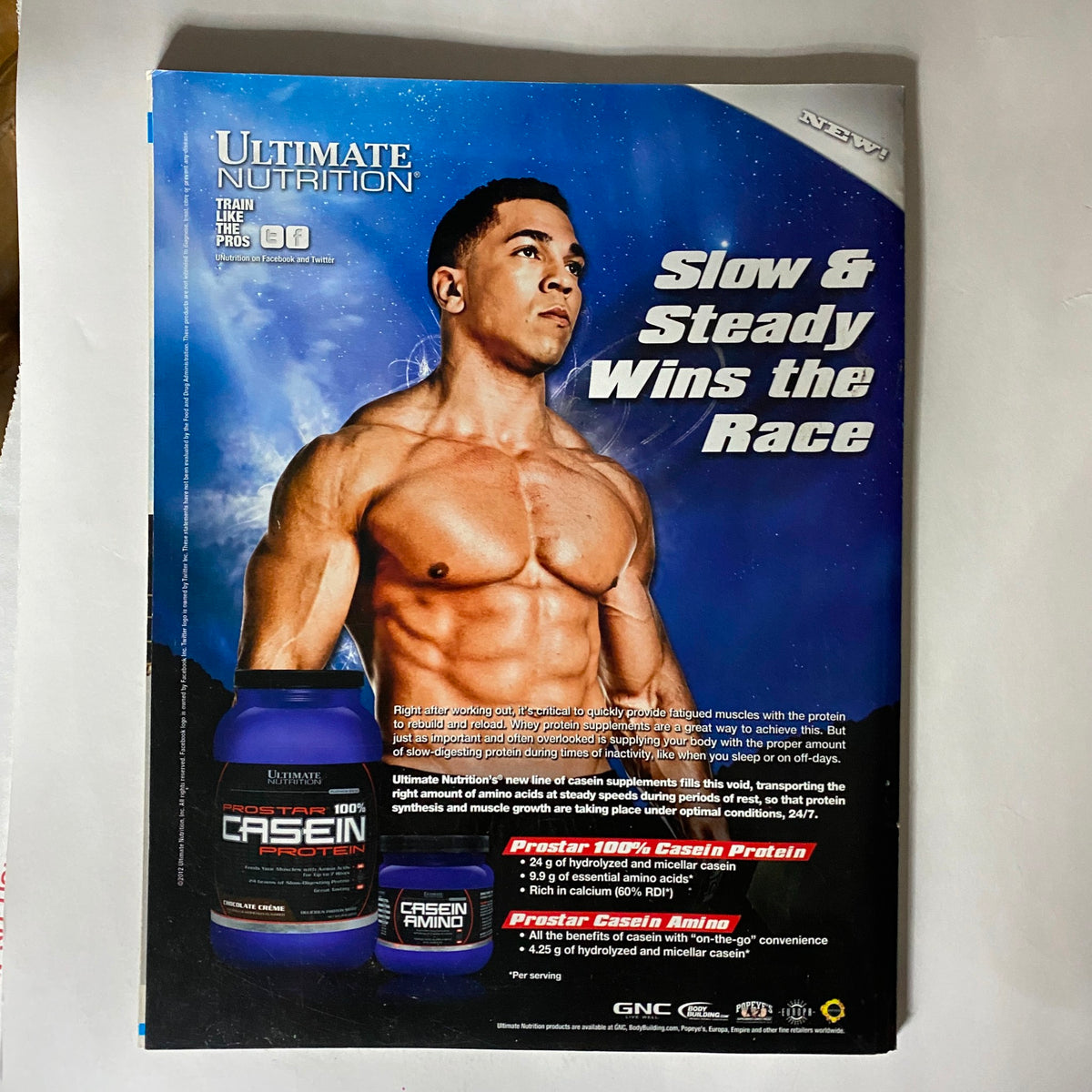 Back cover of Fighters Only US Magazine October 2012 Issue 10, advertising Ultimate Nutrition's casein protein, promoting a fit lifestyle with a muscular model and the slogan 'Slow & Steady Wins the Race.'