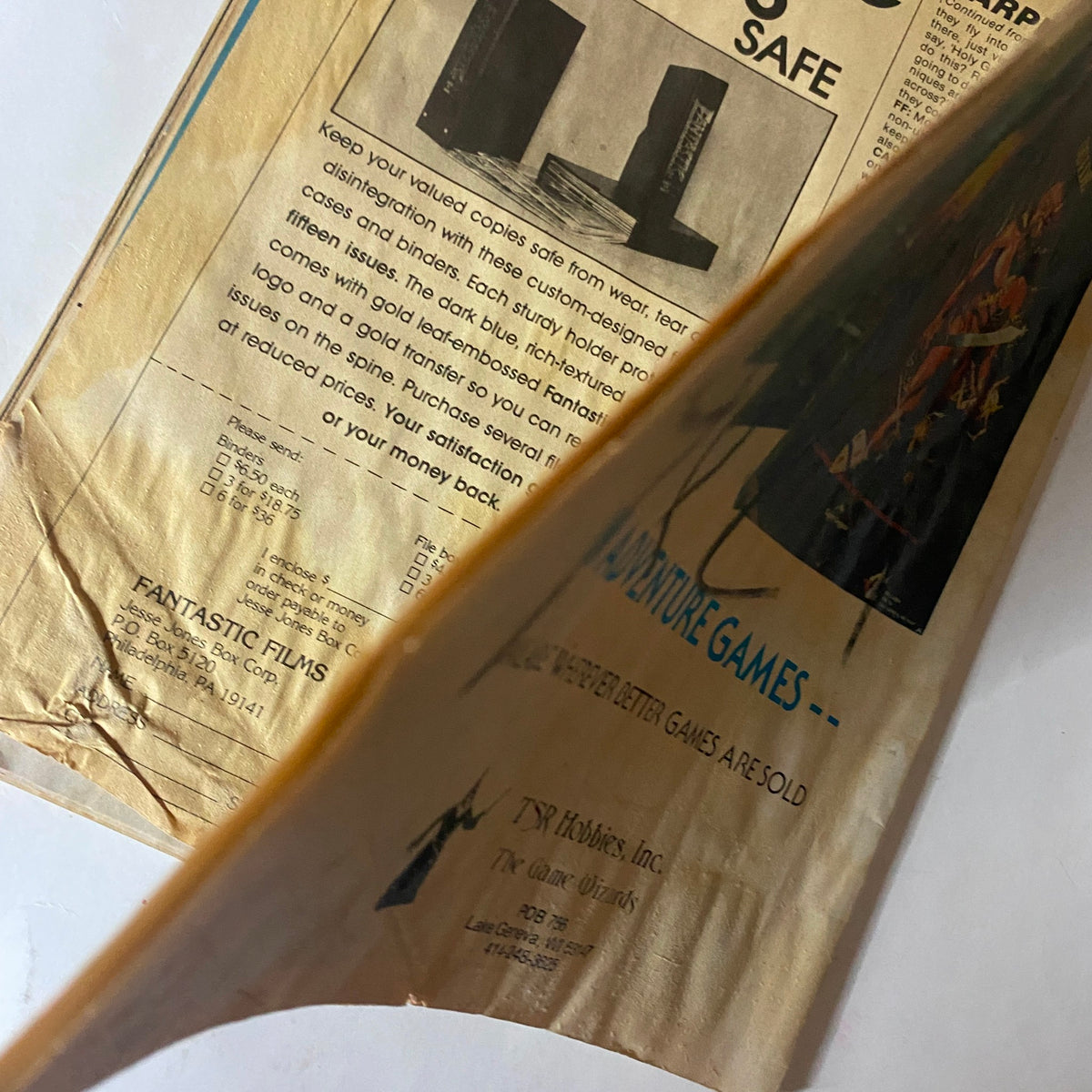 Side view of the VTG Fantastics Films Magazine July 1980 displaying pages and an advertisement for protective cases for magazines.