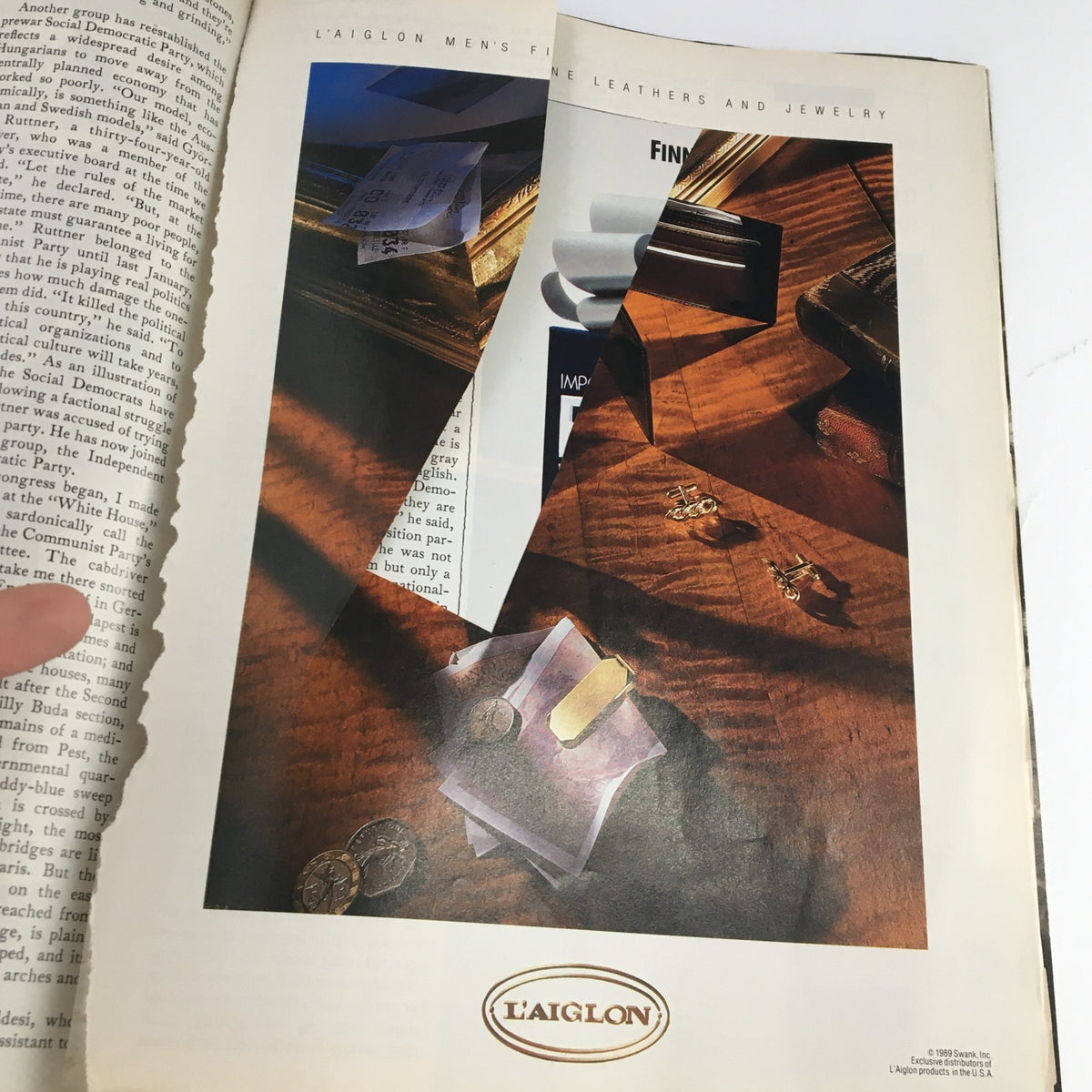 Ad page from The New Yorker Magazine November 20 1989 featuring L'Aiglon men's fine leathers and jewelry, displaying elegant products.