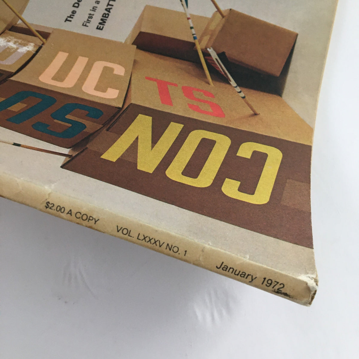 Close-up view of the edge of Fortune Magazine January 1972 displaying the title 'The Detergent Imbroglio: Embattle Consumer Products' alongside details about the issue.