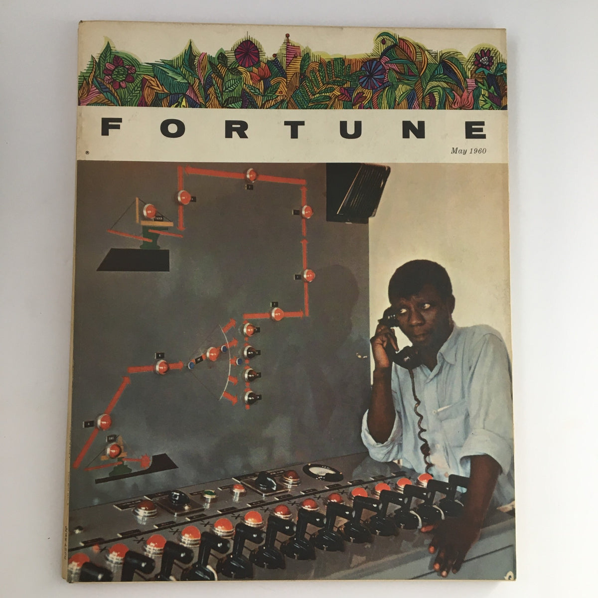 Cover of Fortune Magazine May 1960 featuring a man on the phone surrounded by industrial equipment, showcasing the theme of Harry Oppenheimer's article on Industrial Africa.