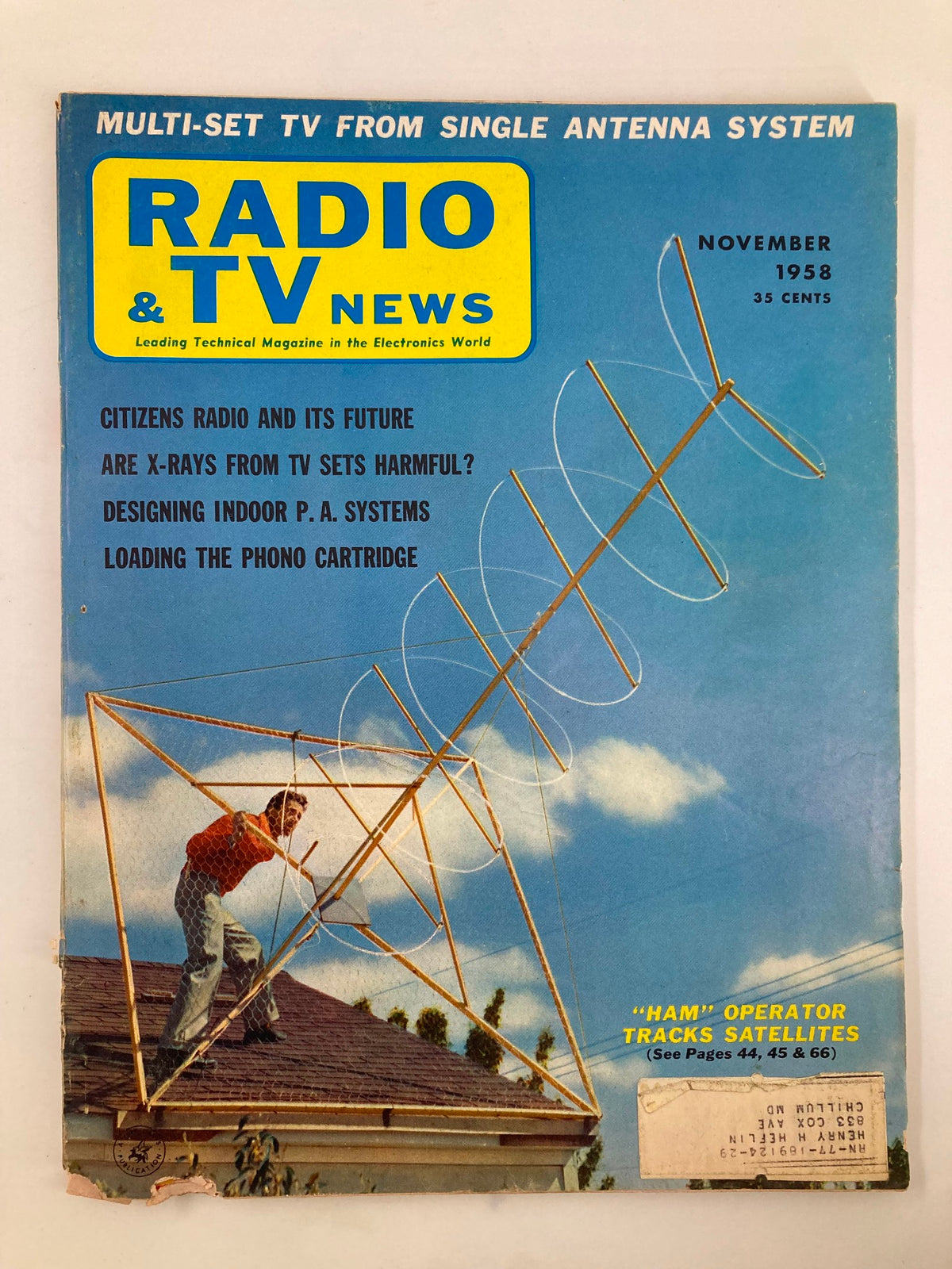 Cover of VTG Radio & TV News Magazine November 1958 featuring a ham operator tracking satellites from a rooftop with a unique antenna.