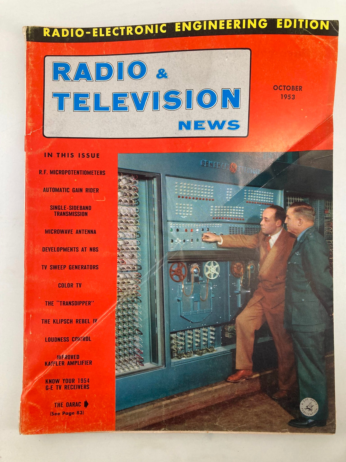 VTG Radio & Television News Magazine October 1953 cover featuring R.F. Micropotentiometers and engineers working on a vintage electronic device.