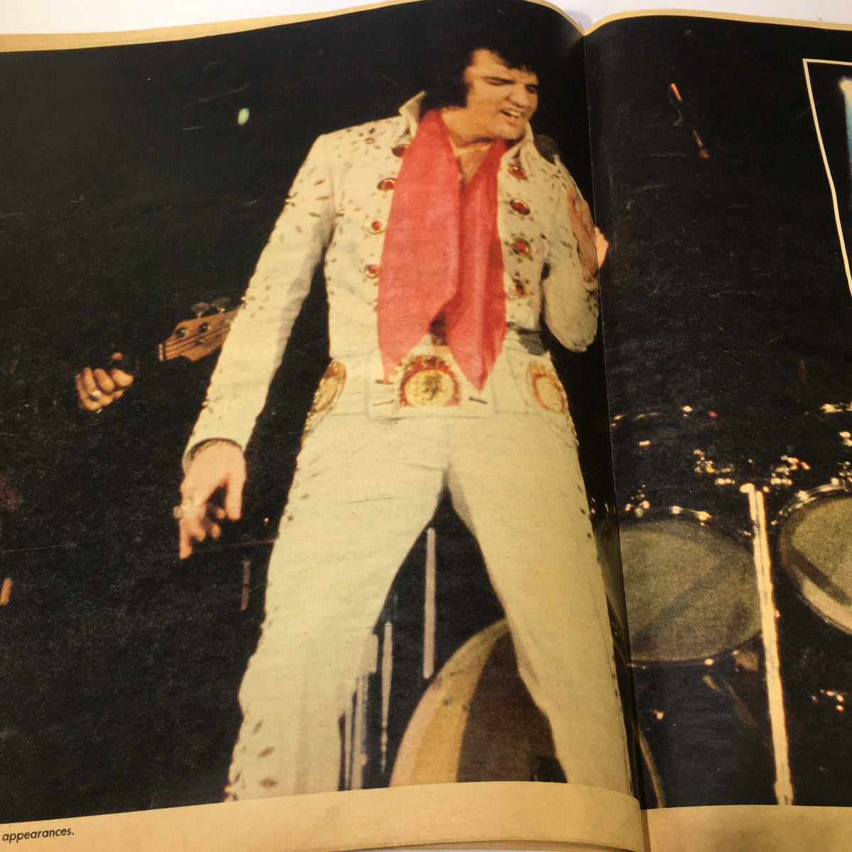 Live performance photograph of Elvis Presley from VTG The Courier Journal Magazine August 22 1977, highlighting his stylish stage presence.