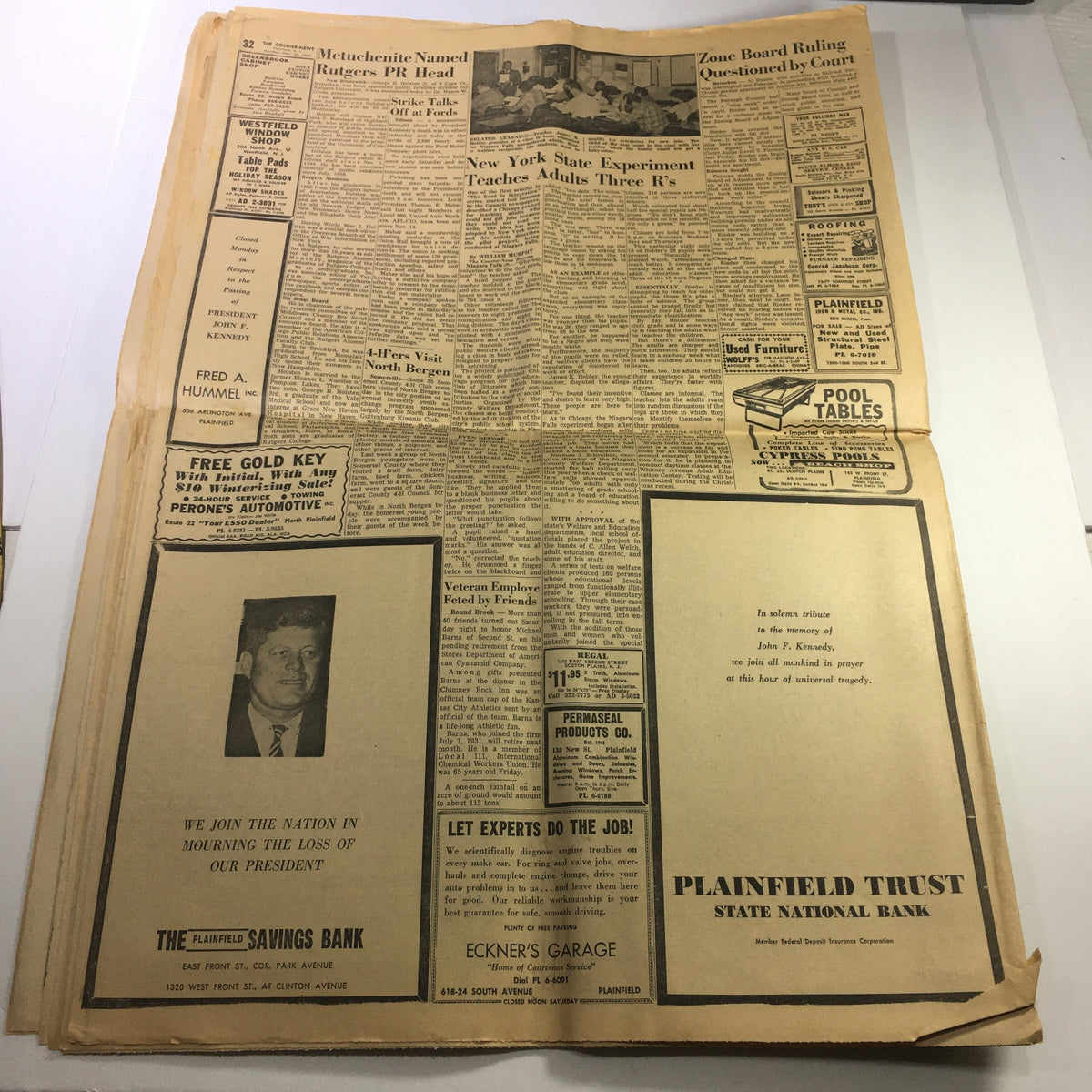 Vintage newspaper from The Courier News, dated November 25, 1963, featuring significant headlines about Lee Harvey Oswald and Jack Ruby, showcasing historical details of a pivotal moment in American history.