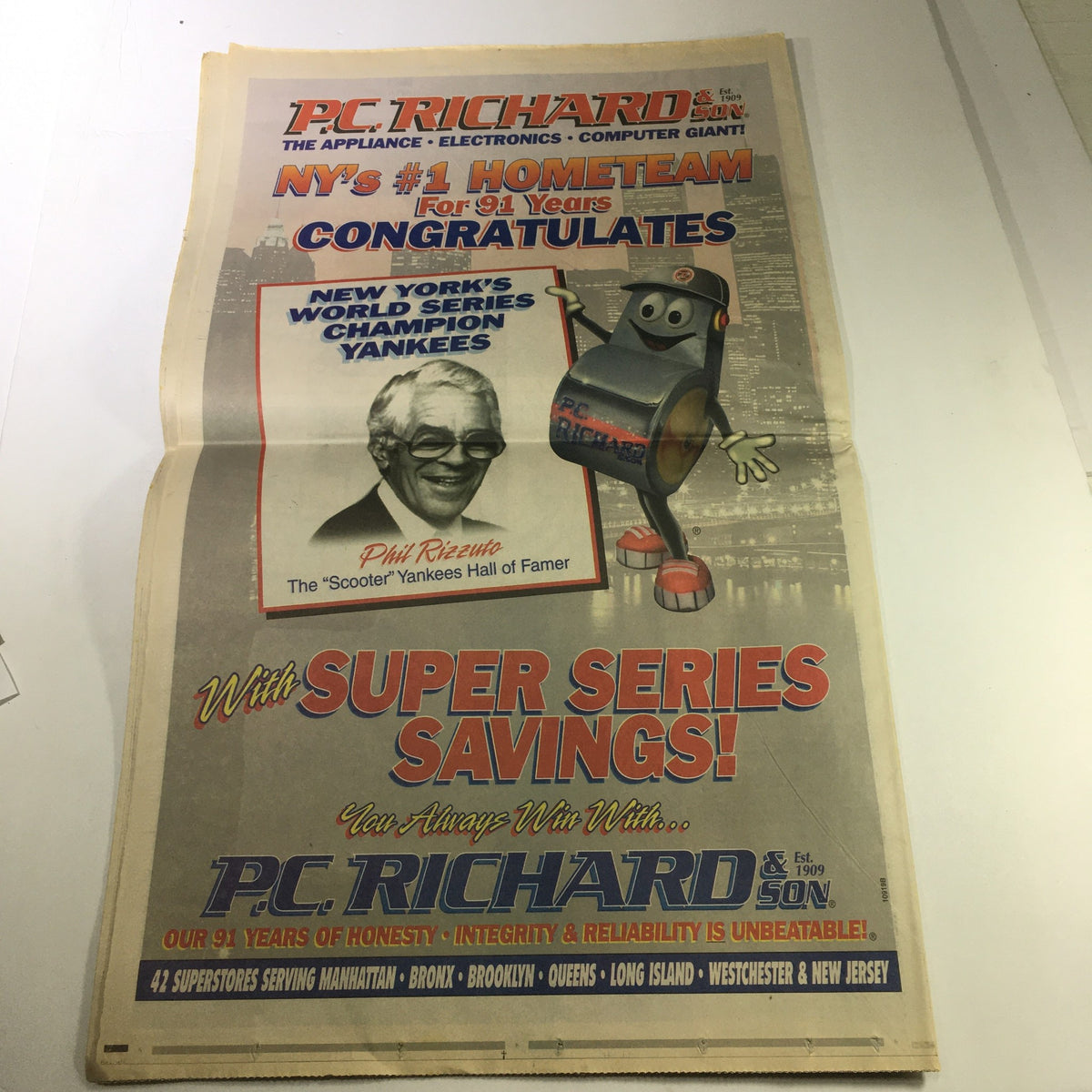 The Star-Ledger Newspaper from October 29, 2000 presenting an advertisement from P.C. Richard and Son congratulating the New York Yankees on their World Series Championship, featuring a cartoon character in a celebratory theme.