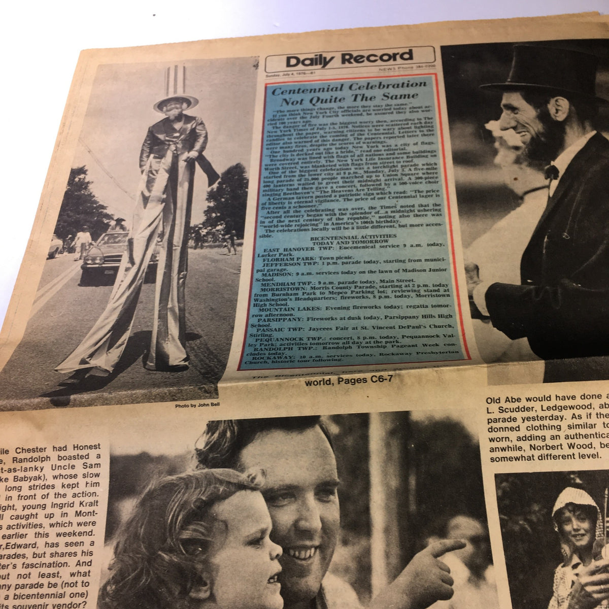 VTG The Daily Record July 4 1976 article highlighting the Centennial Celebration and a tall stilt walker at a parade, representing a significant moment in American history.