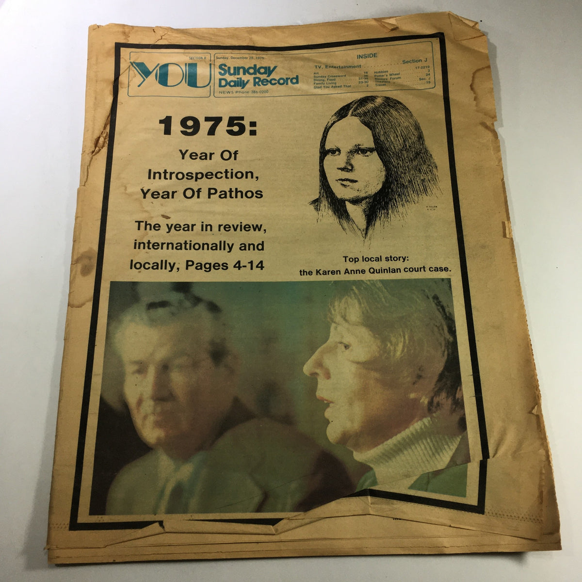 Front page of The Sunday Daily Record dated December 28, 1975, featuring an article on the Karen Anne Quinlan court case and highlighting key year of 1975.