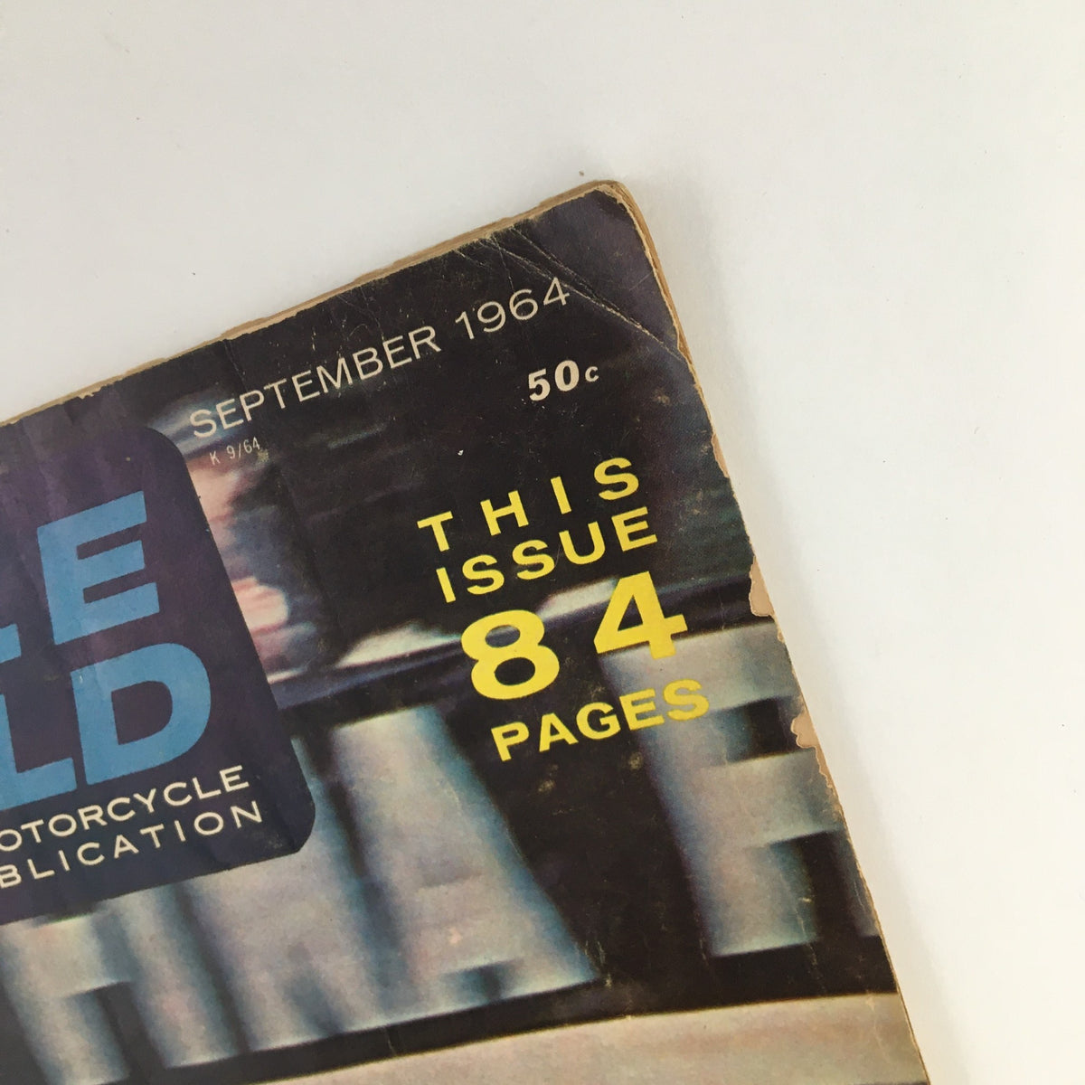 Close-up of the Cycle World Magazine September 1964, displaying the publication date and pricing, emphasizing its collectible nature and historical significance in motorcycle culture.