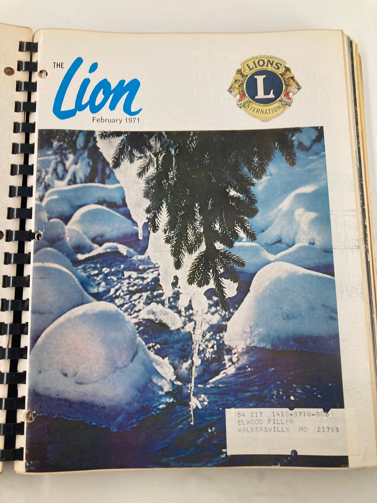 Cover of The Lion Magazine, February 1971, featuring a serene winter landscape with icy branches over a flowing river, part of the 1971 compilation.