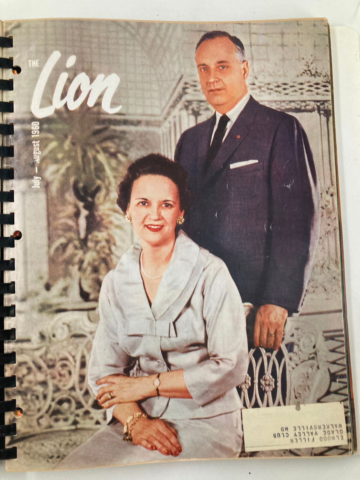 1960 January-December The Lion Magazine Full Year Compilation - July issue cover showcasing a formal portrait of a man and a woman in elegant attire.