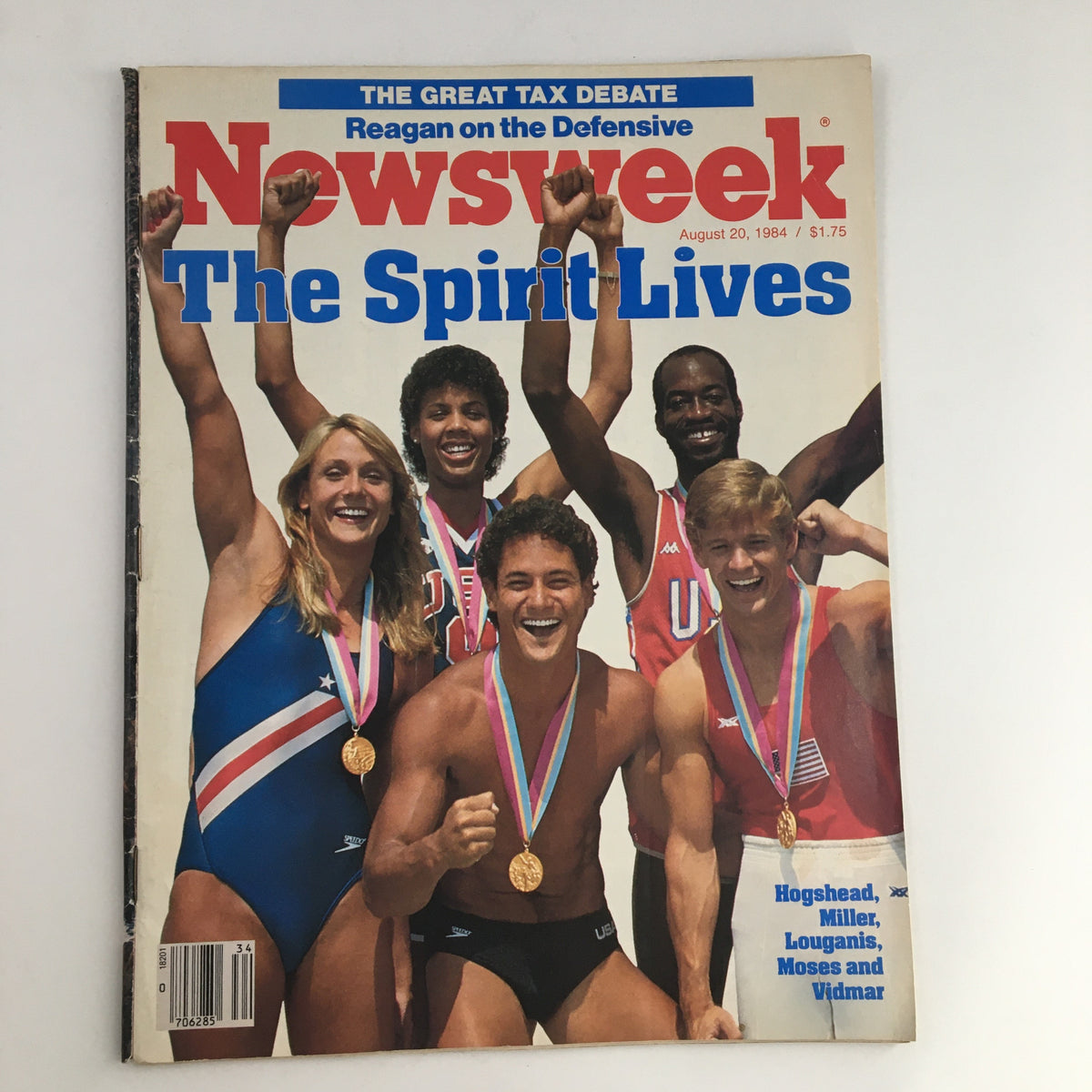 Newsweek Magazine from August 20, 1984 featuring the cover titled 'The Spirit Lives,' showcasing athletes celebrating with medals, highlighting the cultural spirit of the era.