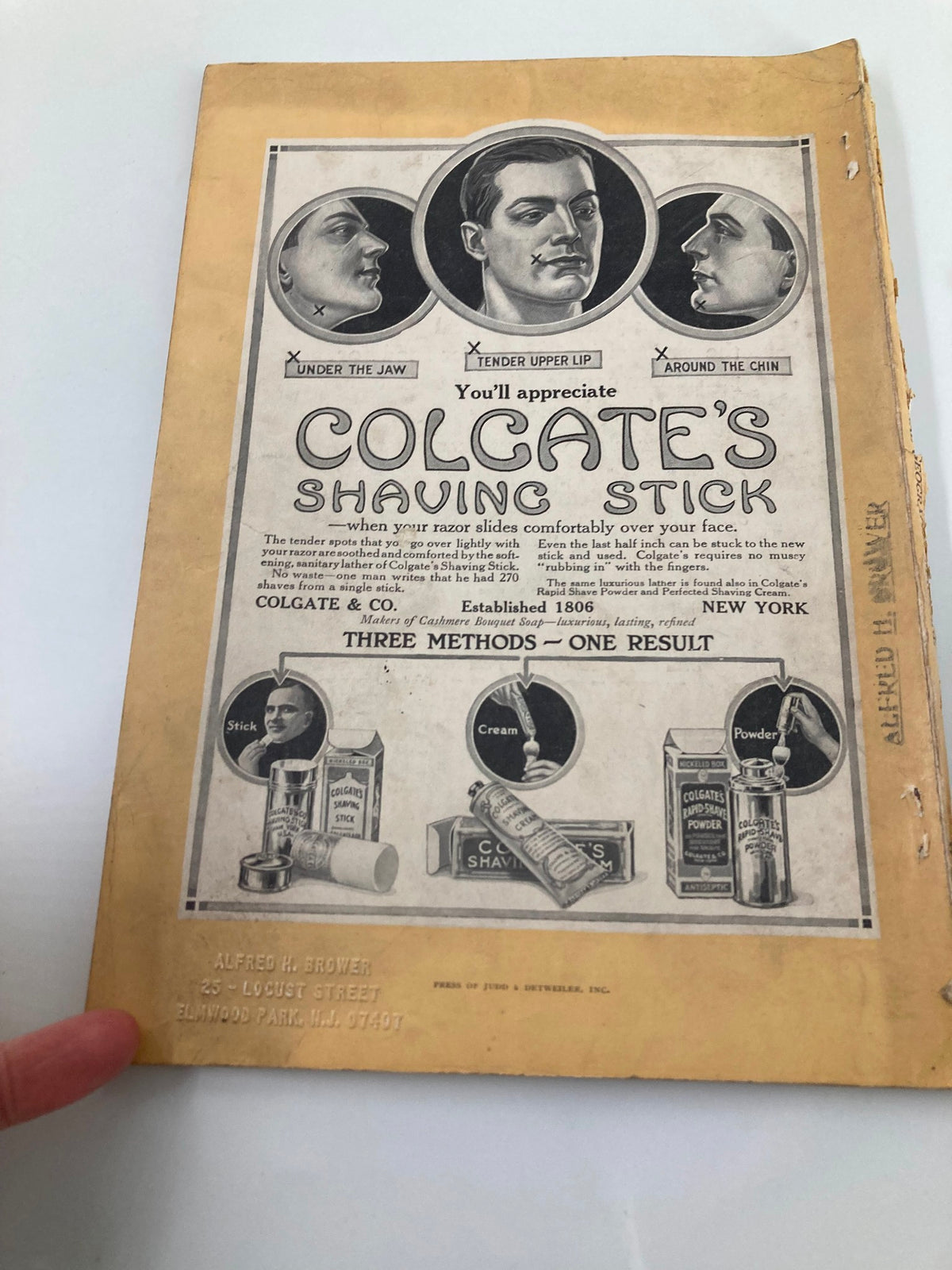 Back cover of the National Geographic Magazine from November 1914, displaying an advertisement for Colgate's Shaving Stick.
