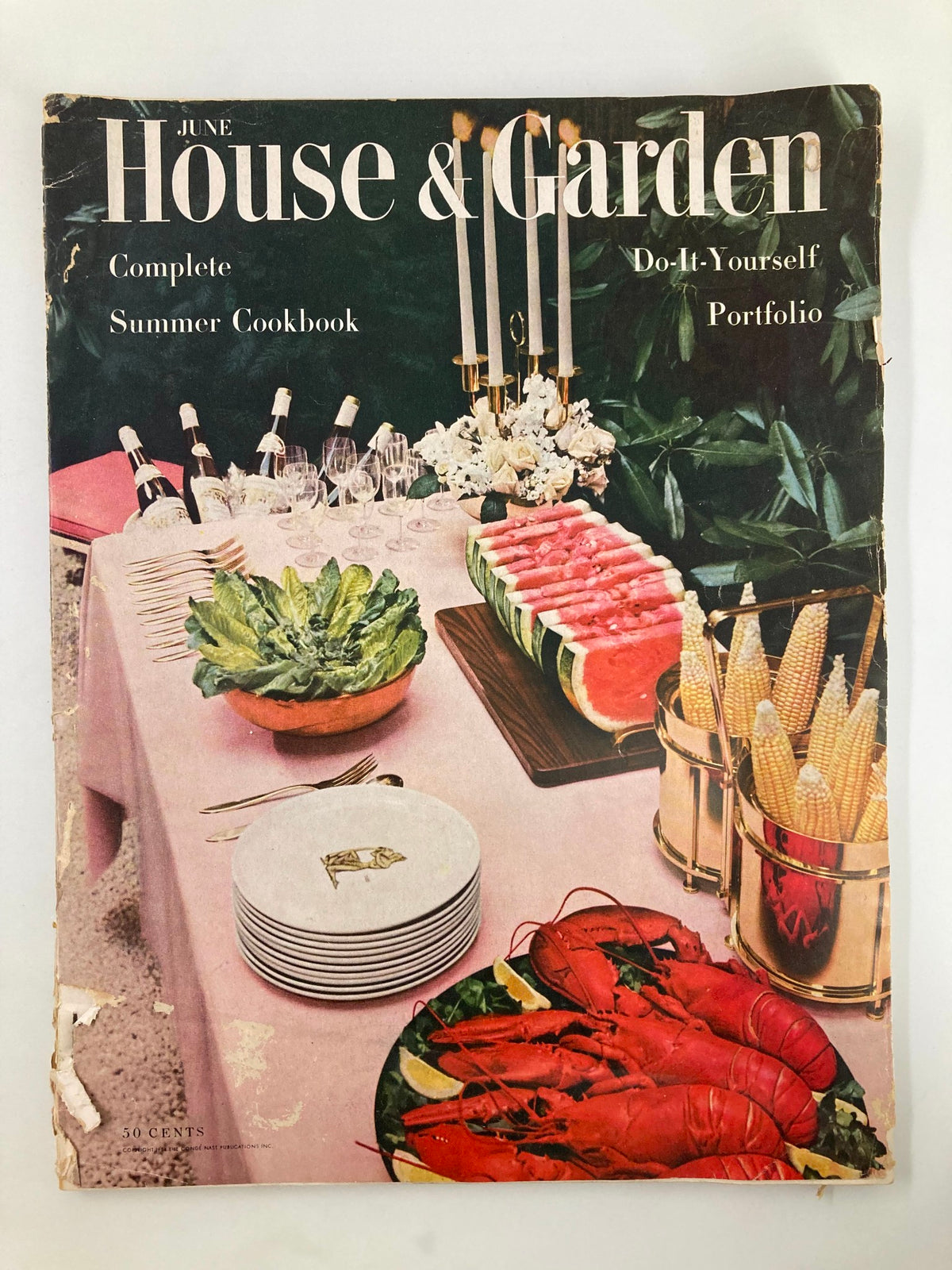 VTG House & Garden Magazine June 1954 cover featuring a summer dining arrangement with fruit, lobster, and elegant table setting, showcasing the Do-It-Yourself Portfolio.