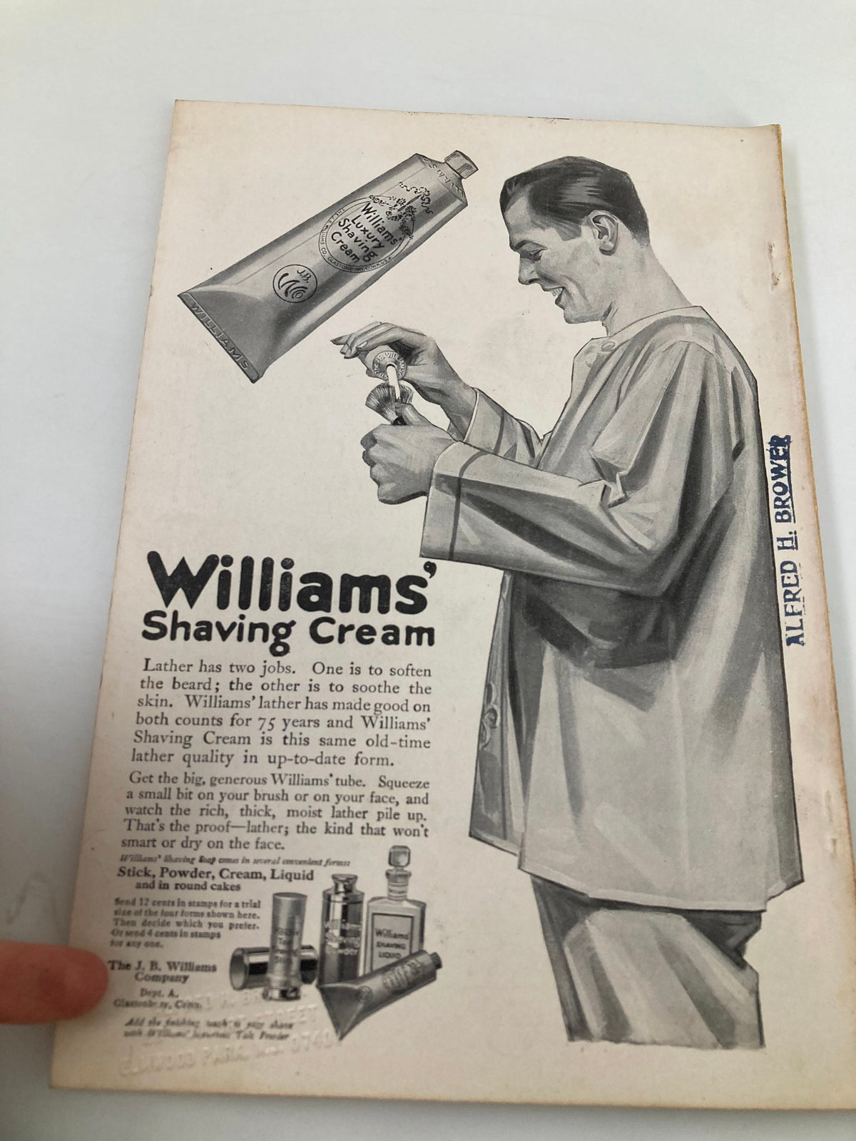 Advertisement for Williams' Shaving Cream in the National Geographic Magazine August 1916, illustrating vintage grooming products and branding.