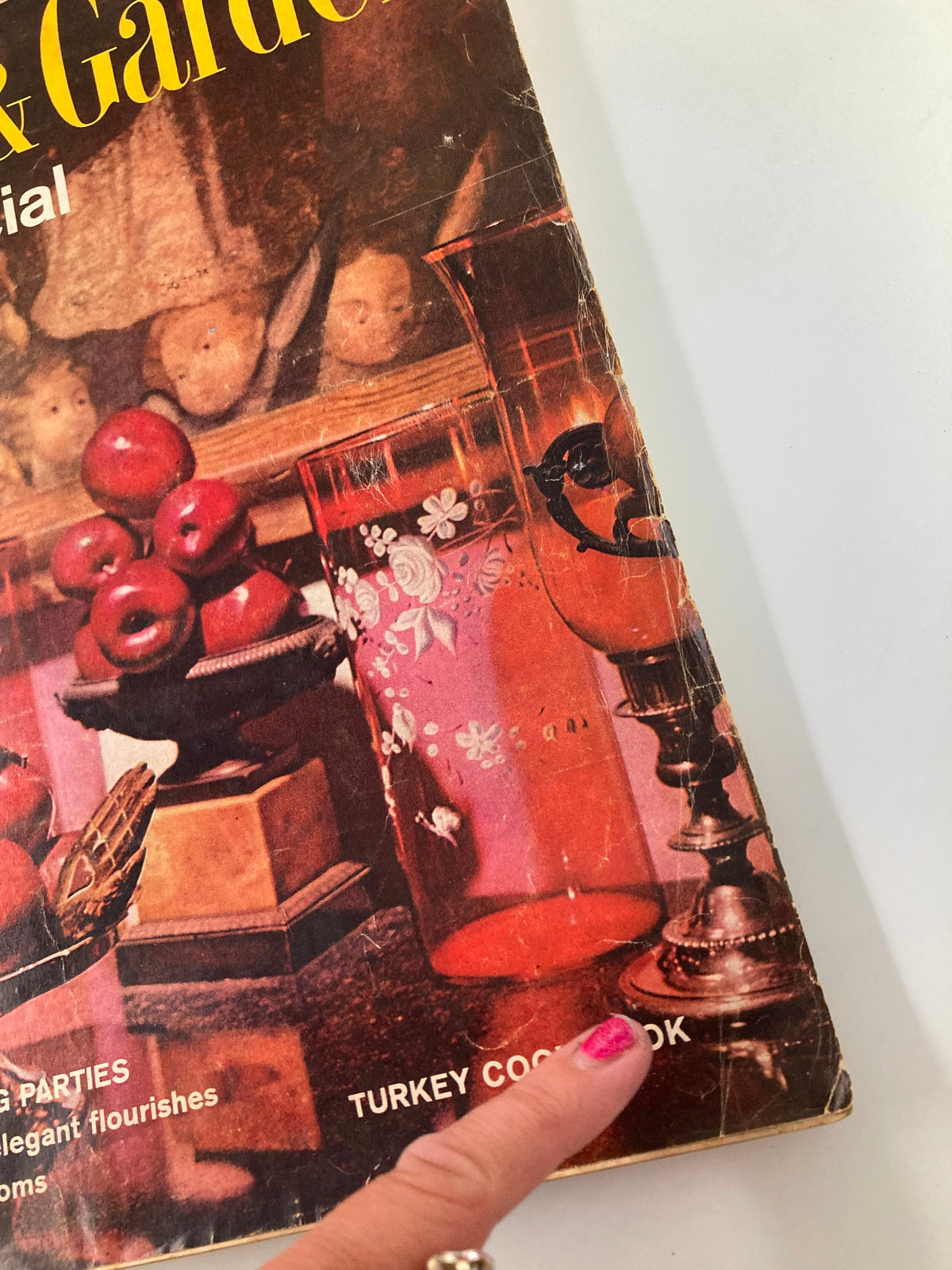 Close-up of the cover of VTG House & Garden Magazine, November 1965, highlighting the wine glass and decorative elements with 'Turkey Cookbook' mentioned.
