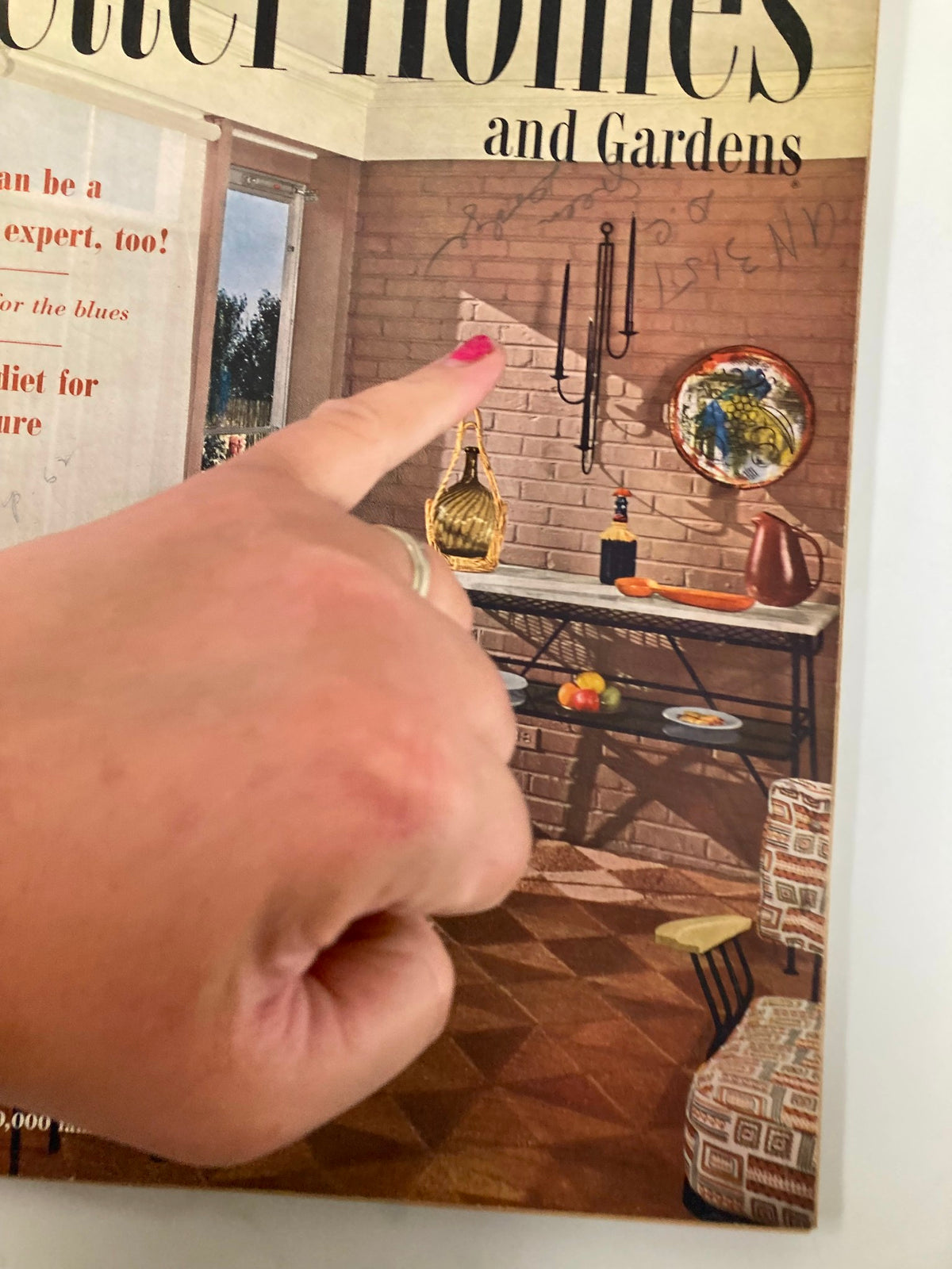 Close-up of the cover of VTG Better Homes & Garden Magazine June 1954 showing a hand pointing at decorative elements and text, emphasizing how to diet for a figure.