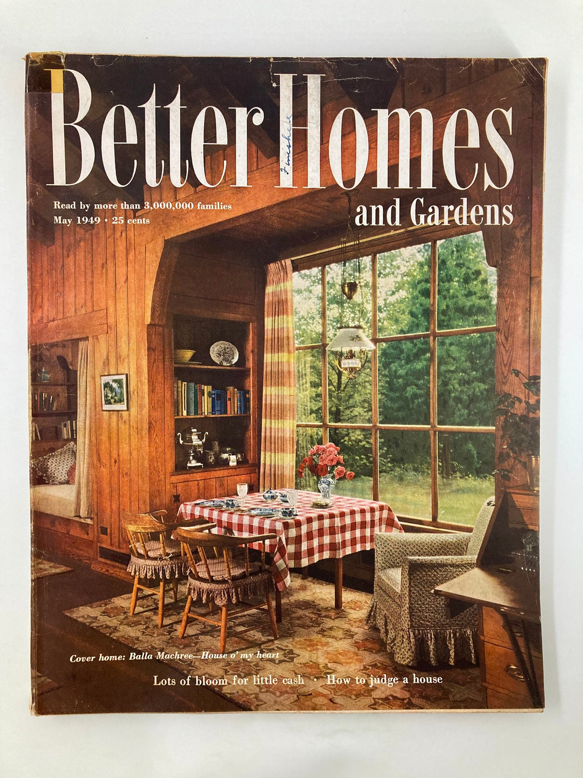 Cover of Better Homes & Garden Magazine May 1949 featuring a charming interior setting and the headline 'Lots of Bloom For Little Cash'. Ideal for collectors of vintage publications.