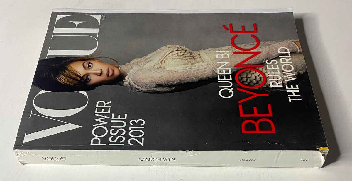 Vogue Magazine March 2013 Beyoncé Knowles Cover showcasing 'Queen B: Beyoncé Rules the World' with a striking image of the singer in a high-fashion couture outfit.