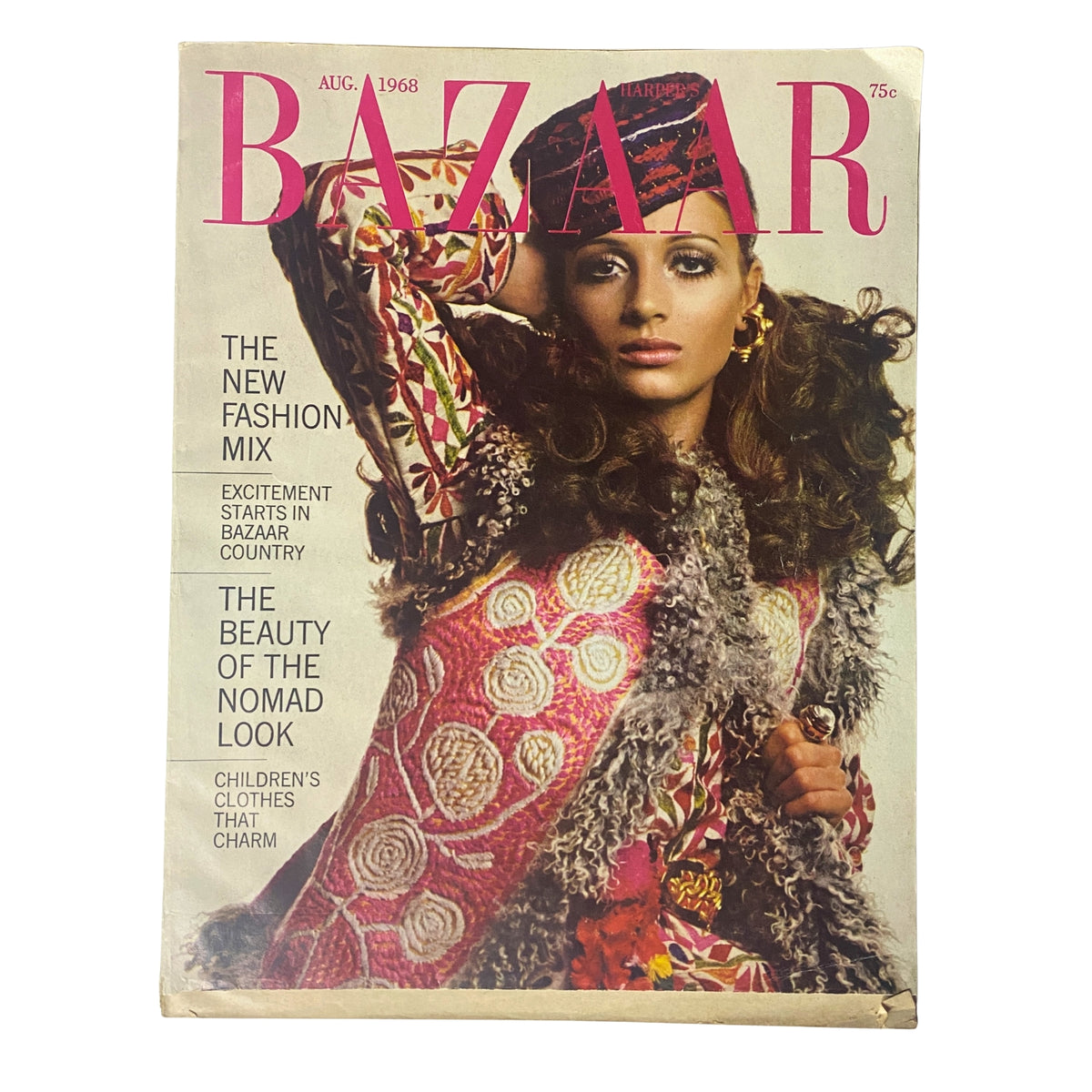 Harper's Bazaar Magazine August 1968 Cover featuring a model styled in vibrant fashion, showcasing the theme 'The Beauty of the Nomad Look'. Captured by photographer Bill King, this cover embodies late-1960s fashion trends with bold colors and intricate patterns.