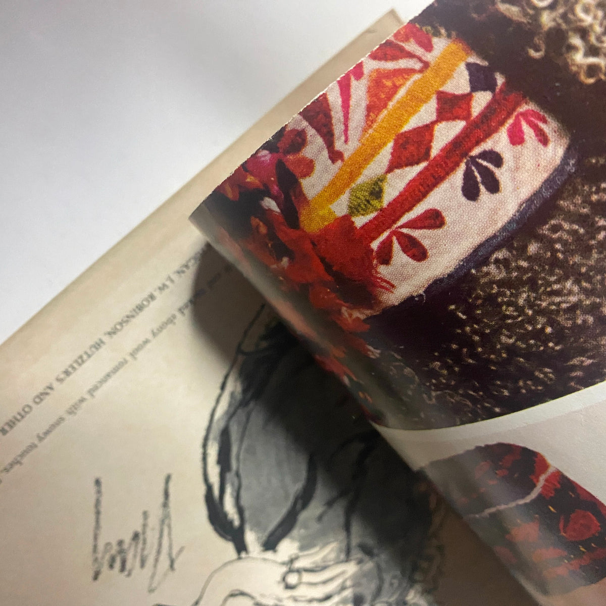 Detailed view of a page from Harper's Bazaar Magazine August 1968 showing vibrant colors and intricate patterns highlighting fashion illustration.