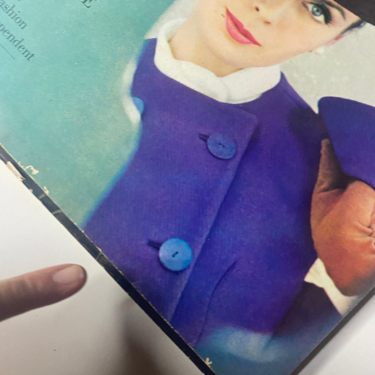 Cover of Harper's Bazaar Magazine August 1963 featuring a fashion model in a stylish violet ensemble with a velvet sombrero, showcasing 1960s fashion trends.