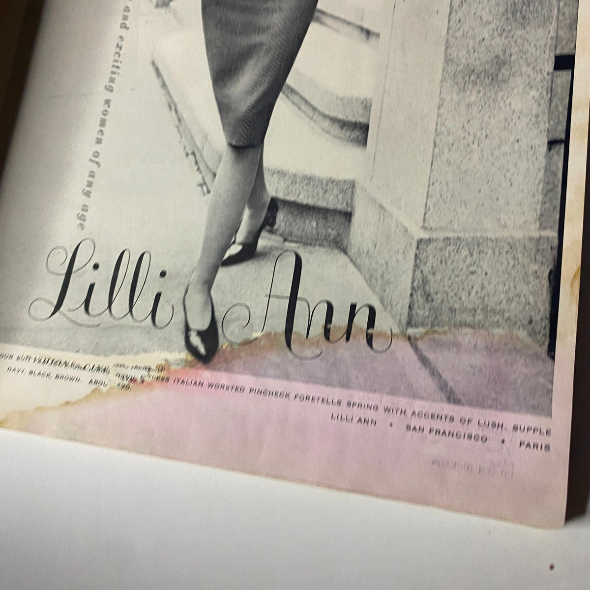 Lilli Ann advertisement showcasing a stylish dress in Harper's Bazaar Magazine December 1960, emphasizing classic fashion.