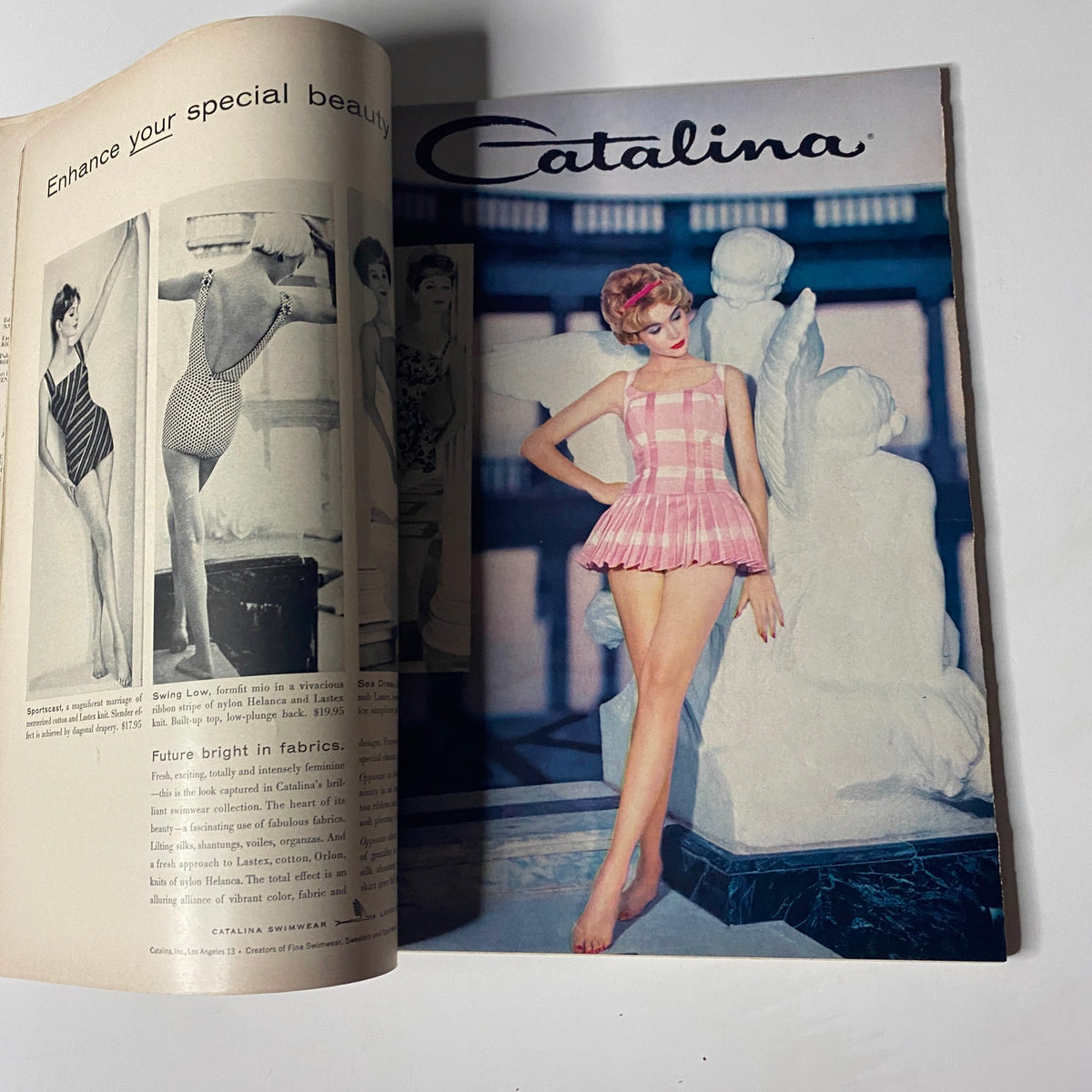 Cover of Harper's Bazaar Magazine February 1959 featuring a model in a striped bathing suit, promoting Catalina swimwear. The magazine showcases the theme of pale fashion tones and embodies the elegance and style of the late 1950s.