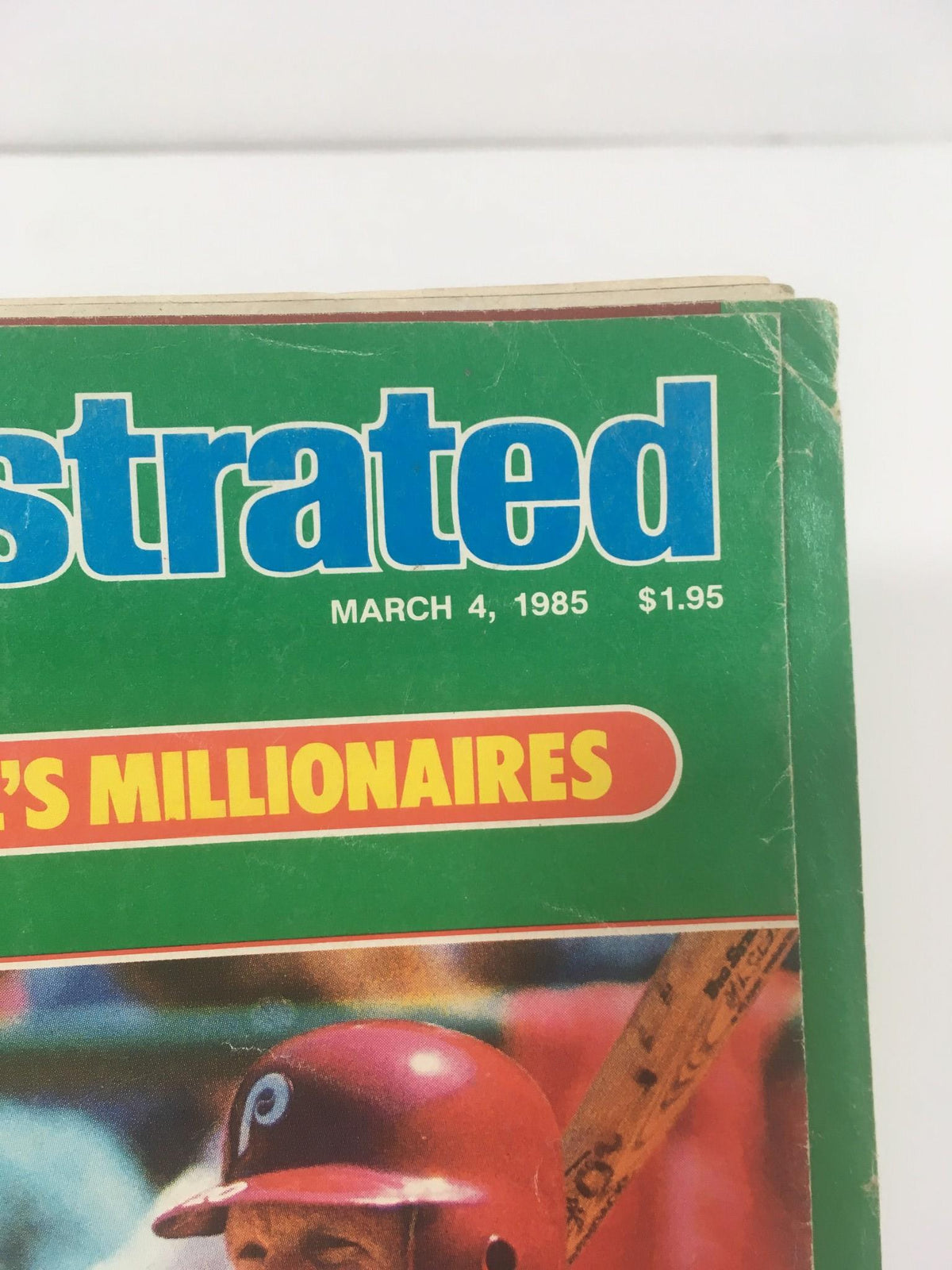 Spors Illustrated March 4 1985 The Money Game: Baseball's Millionaires Magazine cover close-up featuring player statistics.