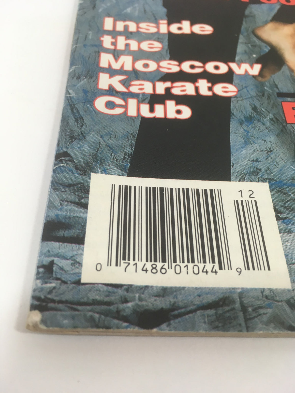 Rear cover of Karate Kung Fu Illustrated magazine, featuring a barcode and promotional text about martial arts articles, from December 1991 issue.