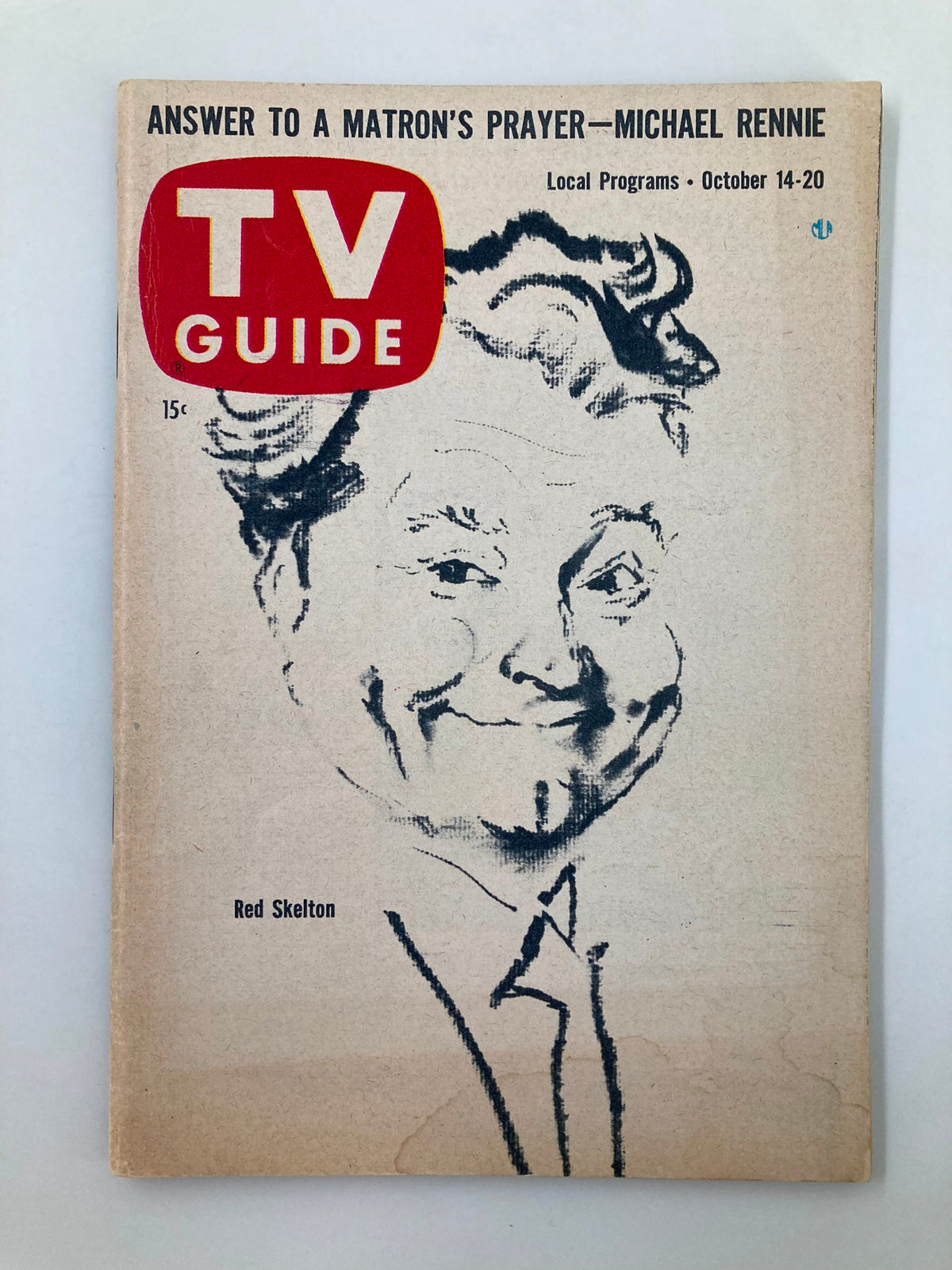 Cover of TV Guide Magazine October 14 1961 featuring Red Skelton, with the title prominently displayed and a caption about local programs.