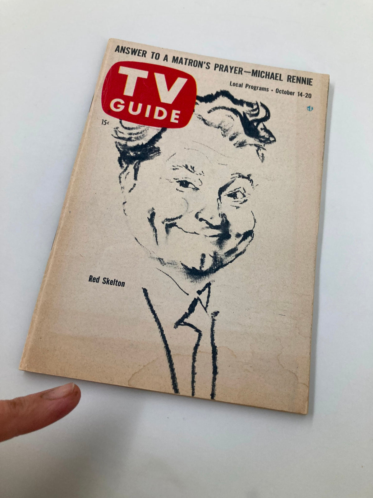 Close-up of TV Guide Magazine October 14 1961 cover showing Red Skelton, highlighting vintage design and features about local programming.