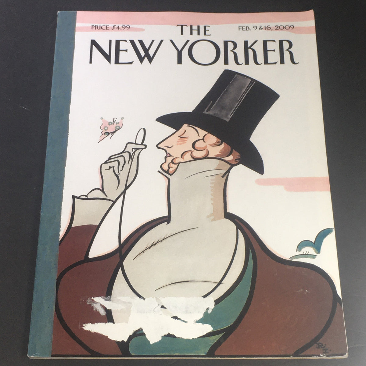 Cover of The New Yorker February 9 & 16, 2009, showcasing an elegant man in a top hat, designed by Rea Irvin, featuring a blend of humor and artistic flair.