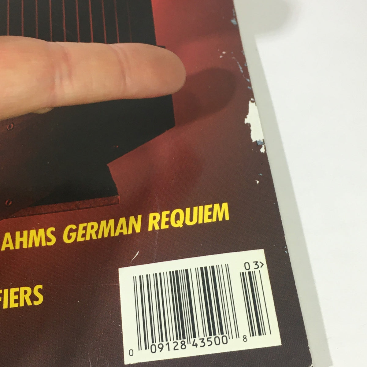 Detail of Stereophile Magazine March 1995 showcasing part of the cover with a focus on Brahms Requiem and some wear on the magazine edges.