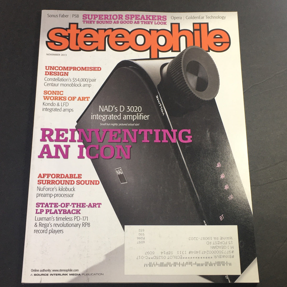 Cover of Stereophile Magazine November 2013 featuring NAD D 3020 integrated amplifier, and reviews of Luxman and Rega RP8 Players, showcasing audio technology insights.
