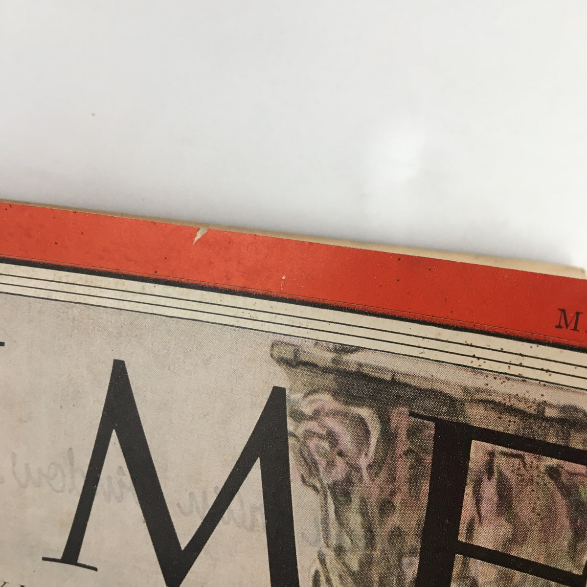 Top edge detail of Time Magazine from May 25, 1953, highlighting the issue's title prominently featuring 'TIME' against a vintage background, indicating the magazine's age and historical significance.