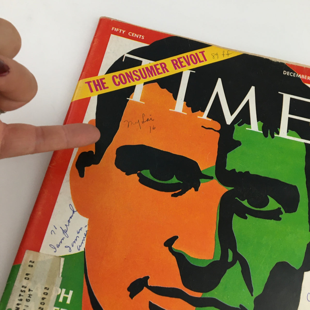 Close-up view of the Time Magazine cover from December 12, 1969, showcasing Ralph Nader with an emphasis on handwritten notes and the prominent 'THE CONSUMER REVOLT' headline, capturing a key moment in American activism.
