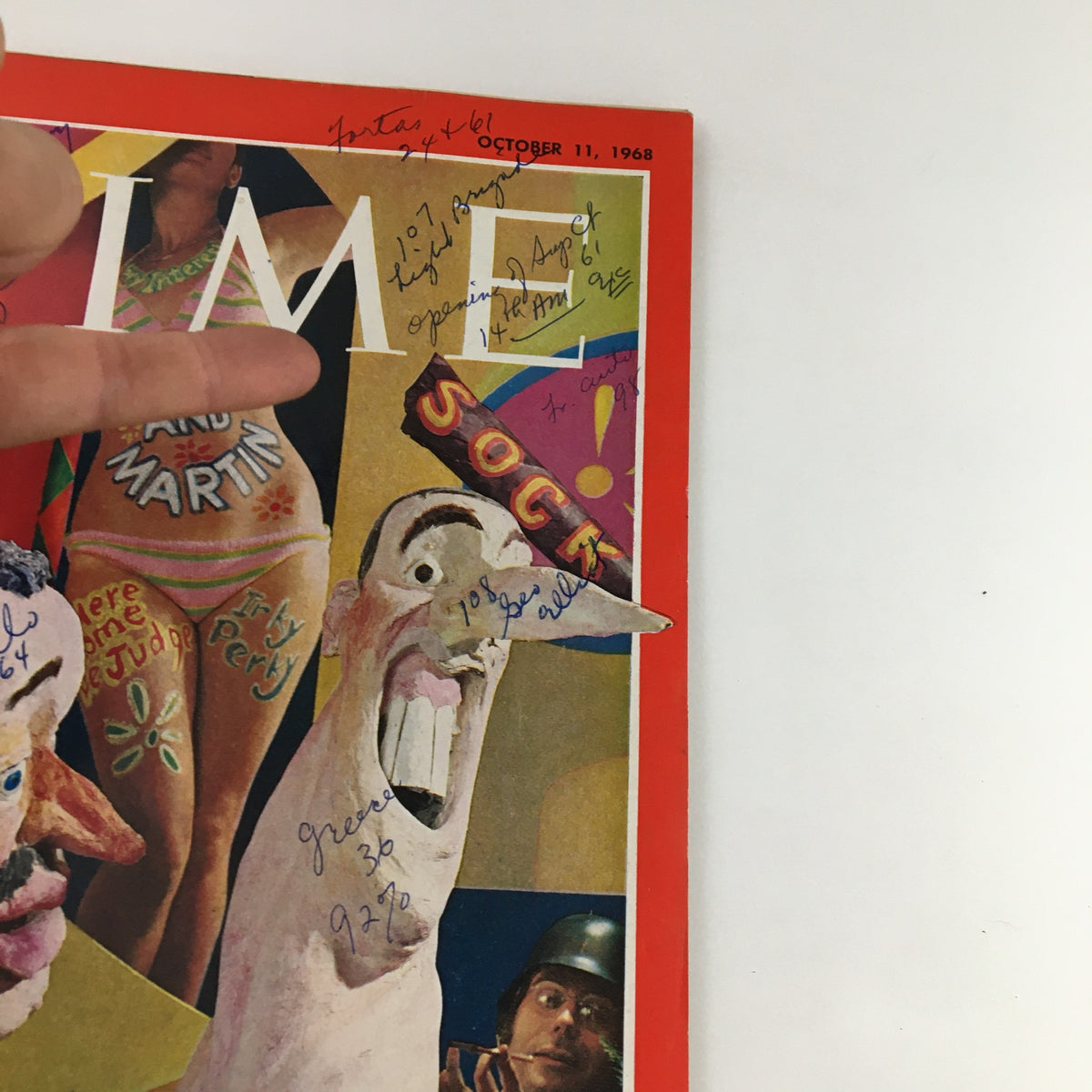 Another angle of the Time Magazine Cover from October 11, 1968 highlighting comedians Dick Martin and Dan Rowan, showcasing colorful artwork and unique inscriptions.