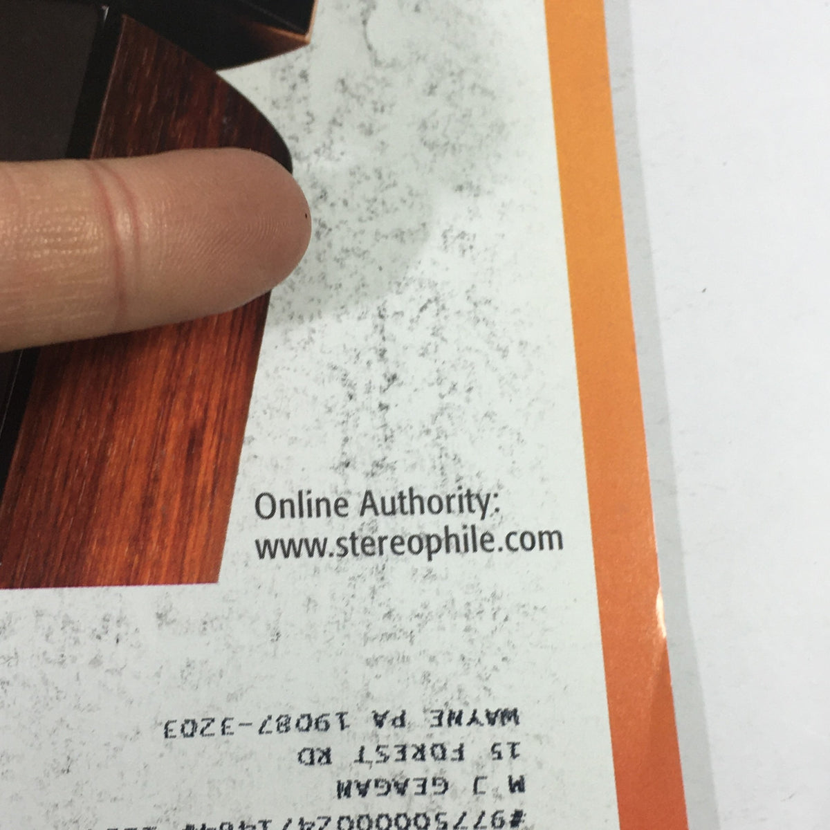 Detail of Stereophile Magazine April 2011 showing the online authority information at the bottom of the cover.