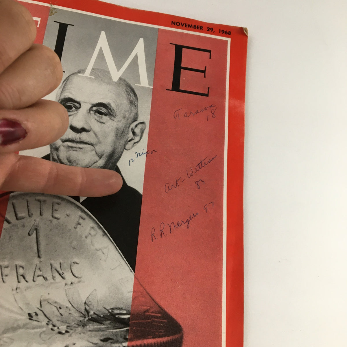 Detailed close-up of Time Magazine November 29 1968 cover with Charles de Gaulle, displaying inscriptions and the significant 1 franc coin.