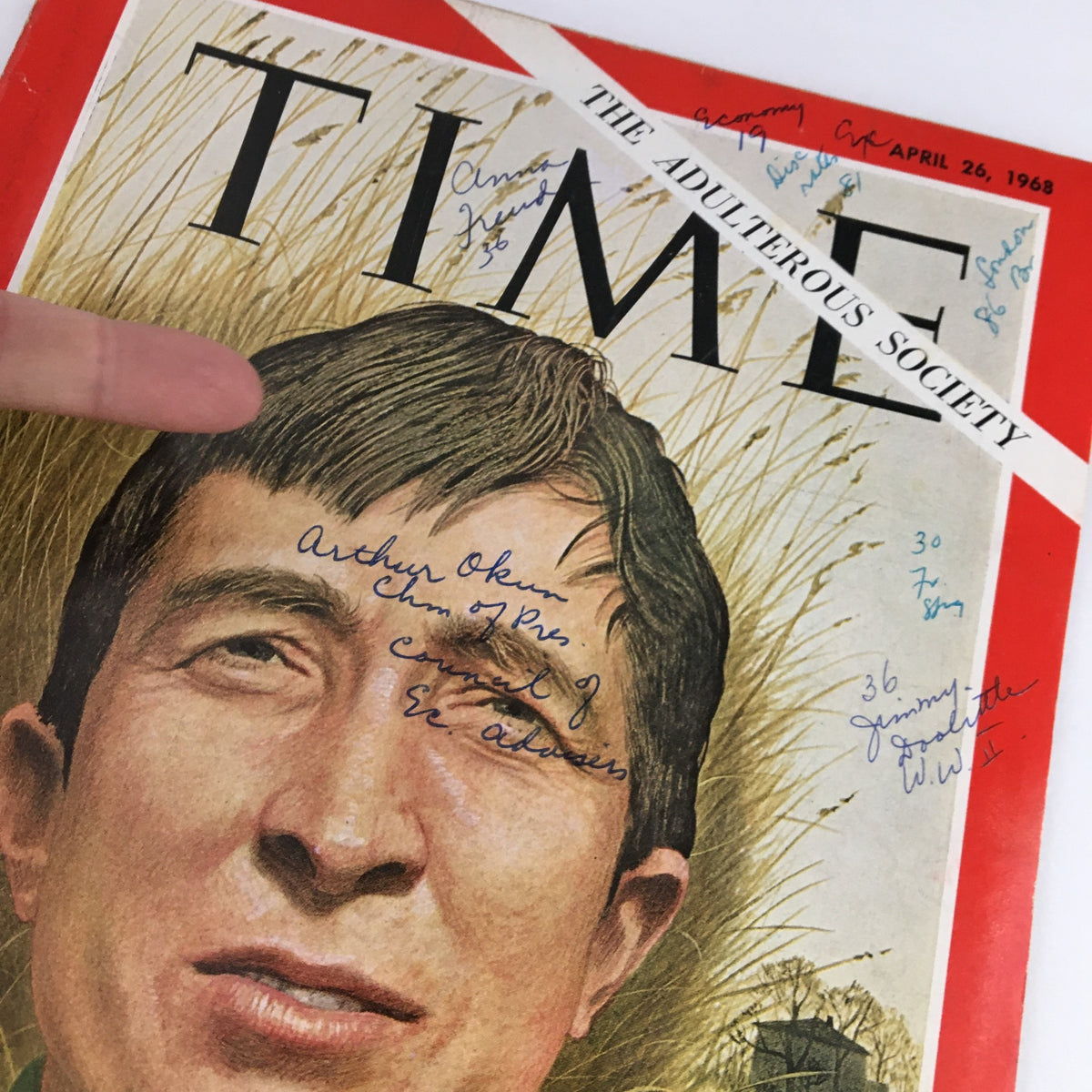 Close-up of the Time Magazine April 26 1968 cover featuring John Updike, highlighting handwritten notes and details around the subject's image.
