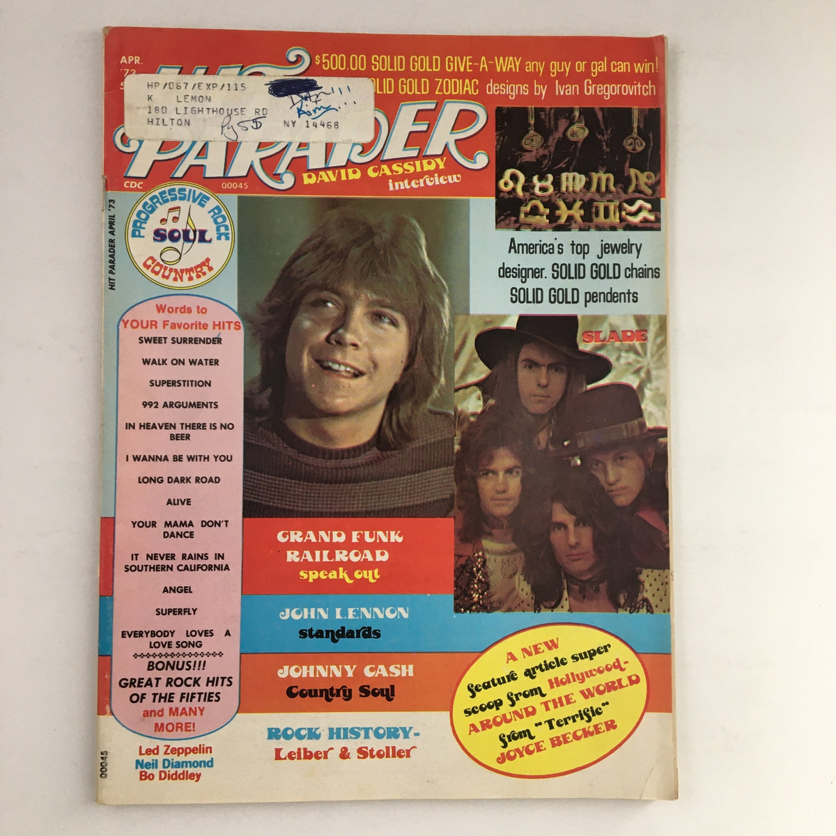 Cover of Hit Parader Magazine April 1973 featuring David Cassidy, John Lennon, and Johnny Cash with a nostalgic design and highlighted articles.
