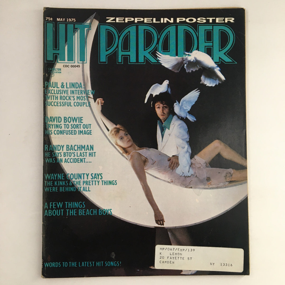 Cover of Hit Parader Magazine May 1975 featuring Paul McCartney, Linda McCartney, David Bowie, and Led Zeppelin, with a unique artistic design and relevant headlines.